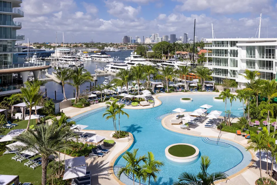 Marina-front resort pool deck with cabanas